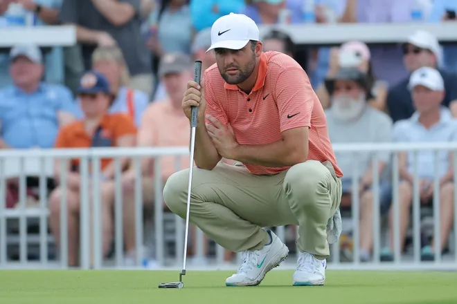 Scottie Scheffler of the United States lines up his putt on the 13th hole green during the third round of the Texas Children's Houston Open 2025 at Memorial Park Golf Course on March 29, 2025 in Houston, Texas.