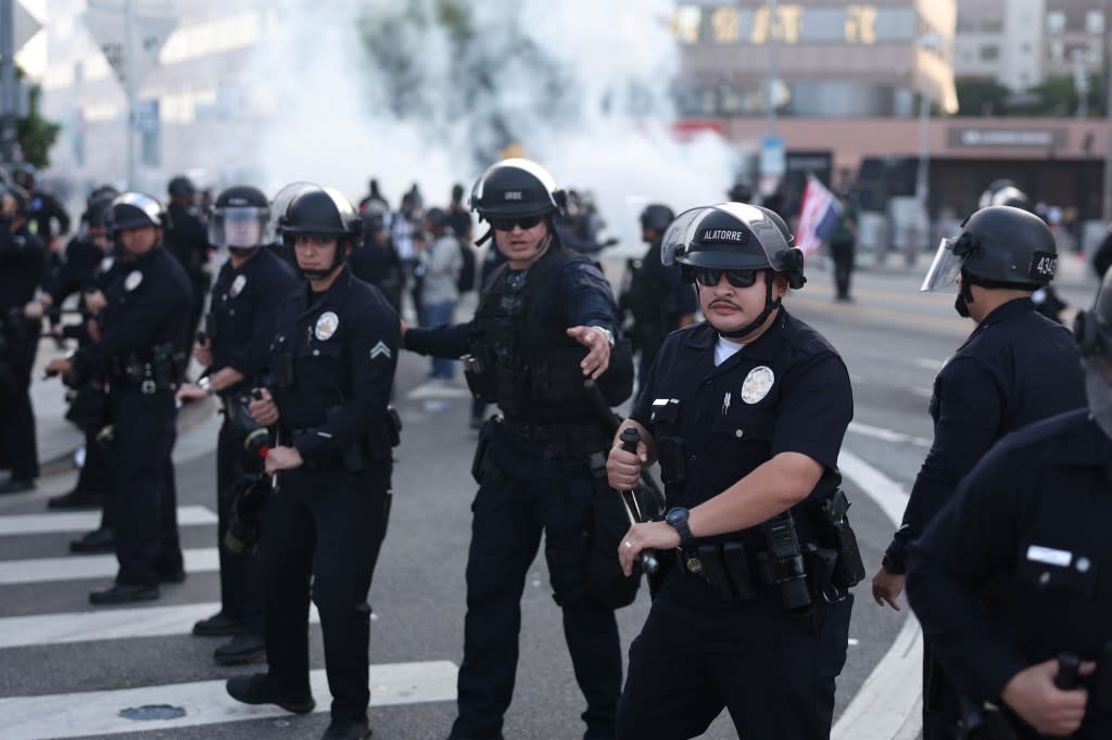 Police attempt to control the protest in Los Angeles. Toby Canham for CA Post