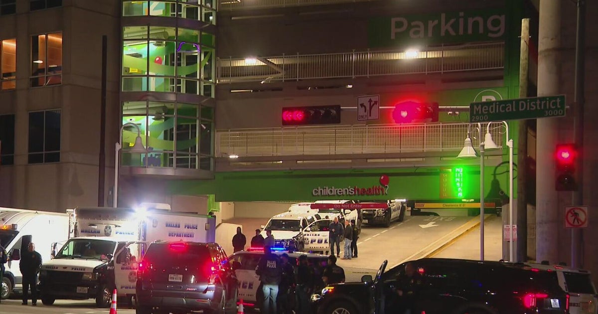 Dallas police kill armed suspect after standoff in hospital parking garage