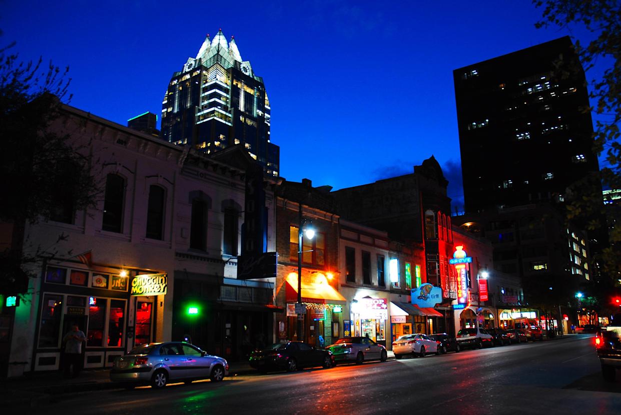 Live music clubs along Sixth Street in downtown Austin Texas at night