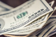 Close-up view of stack of US dollars.