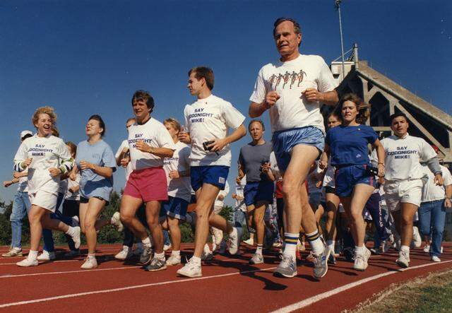 Oct. 6, 1988: Vice President George H.W. Bush leads a group of TCU students for a jog around the track next to Amon G. Carter Stadium in Fort Worth. Bush, who was running for president against Michael Dukakis, went for the morning jog after speaking to a group of law enforcement officers at the Worthington Hotel.