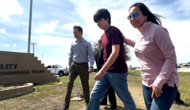 A U.S. Border Patrol agent walk up to a new section of the border wall before the arrival of Acting Homeland Secretary Chad Wolf Thursday, Oct. 29, 2020, in McAllen, Texas. (Joel Martinez/The Monitor via AP)