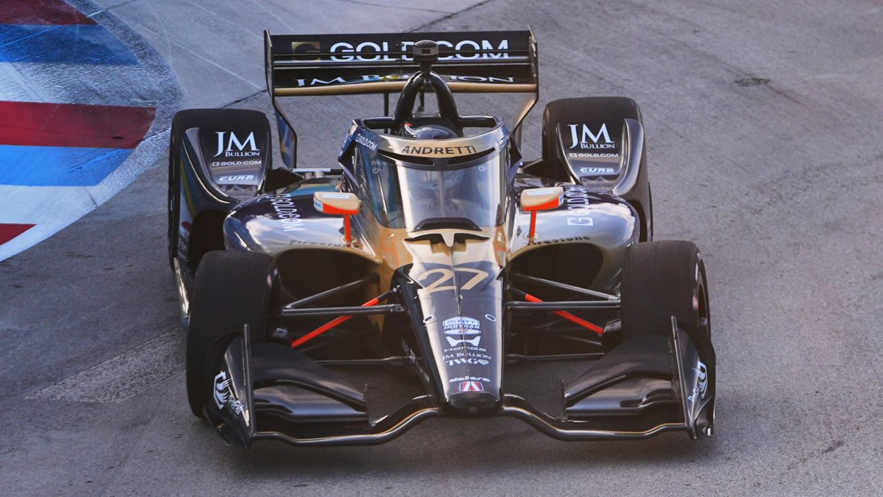 Driver Kyle Kirkwood takes a turn during practice for IndyCar Grand Prix of Arlington auto race, Saturday, March 14, 2026, in Arlington, Texas. (AP Photo/LM Otero)