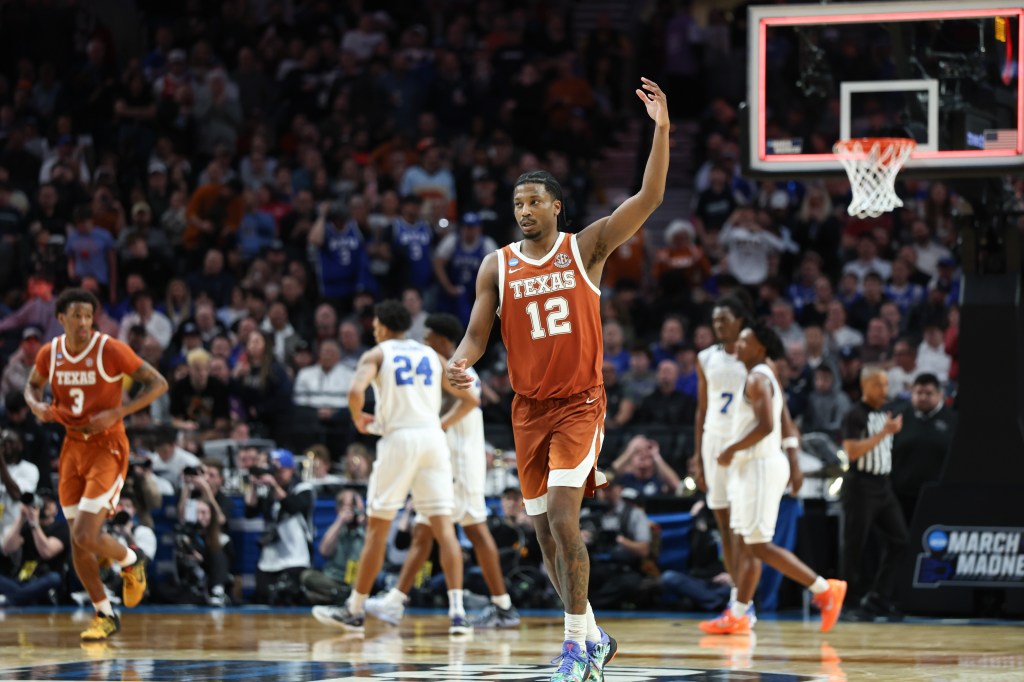 Texas guard Tramon Mark (12) reacts after the first round of the NCAA college basketball tournament against BYU, Thursday, March 19, 2026, in Portland, Ore.