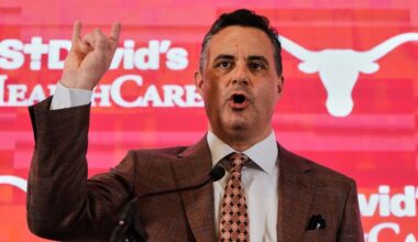 Texas' new coach Sean Miller gives a "Hook'em Horns" sign after he was introduced during an NCAA college basketball news conference in Austin, Texas, Tuesday, March 25, 2025. (AP Photo/Eric Gay, File)