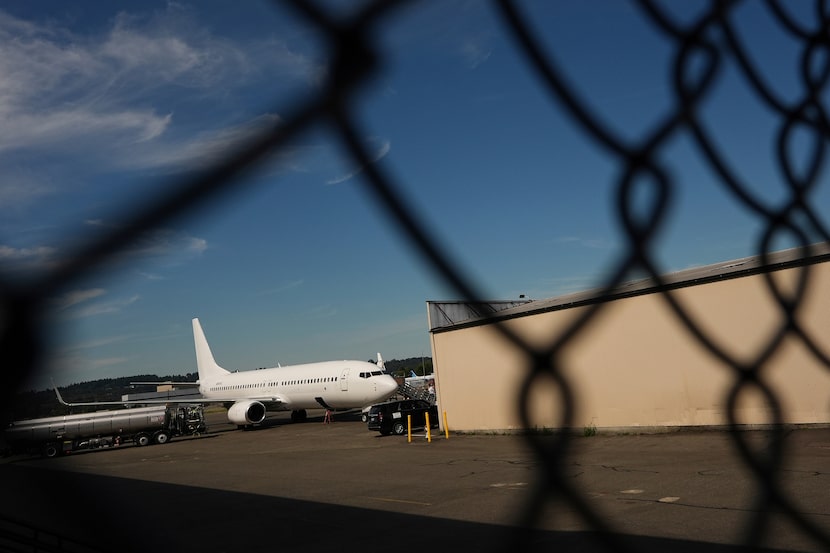 A U.S. Immigration and Customs Enforcement flight operates out of King County International...