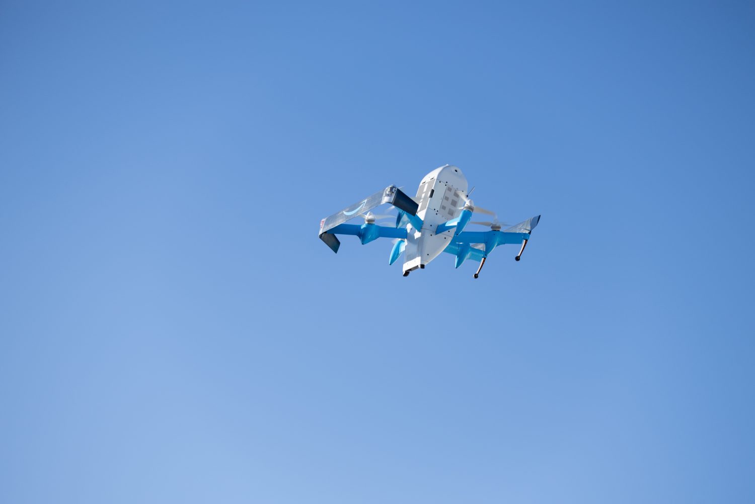 an Amazon delivery drone flies around North Texas