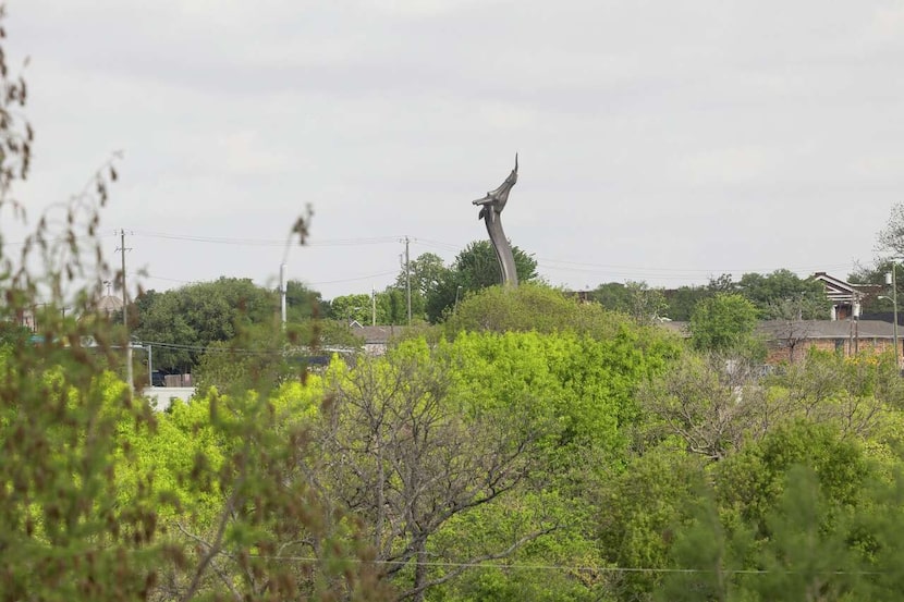 The Dallas Zoo’s giraffe statue seen from the top floor of the Zoo’s new guest parking...