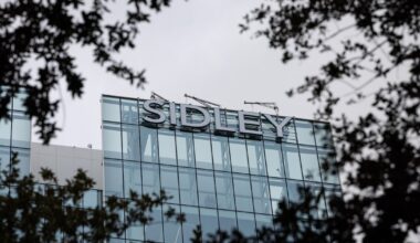 Firm leaves its mark on Uptown’s tallest tower