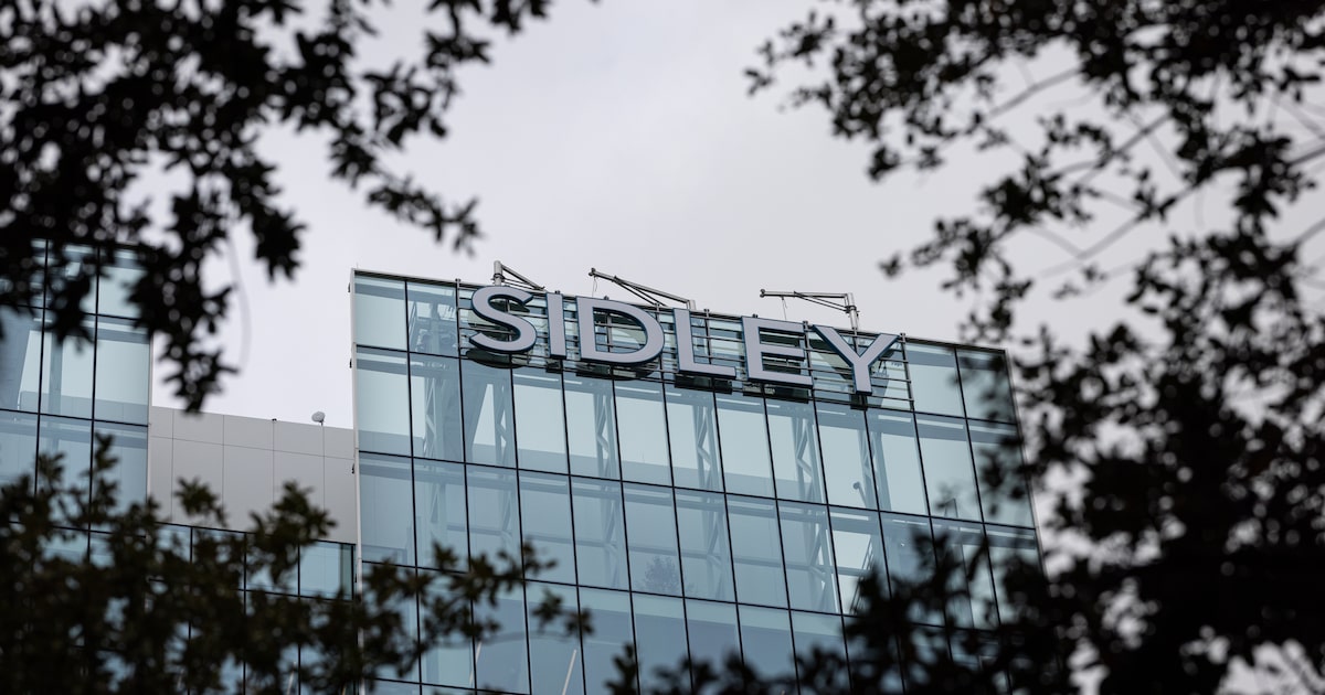 Firm leaves its mark on Uptown’s tallest tower