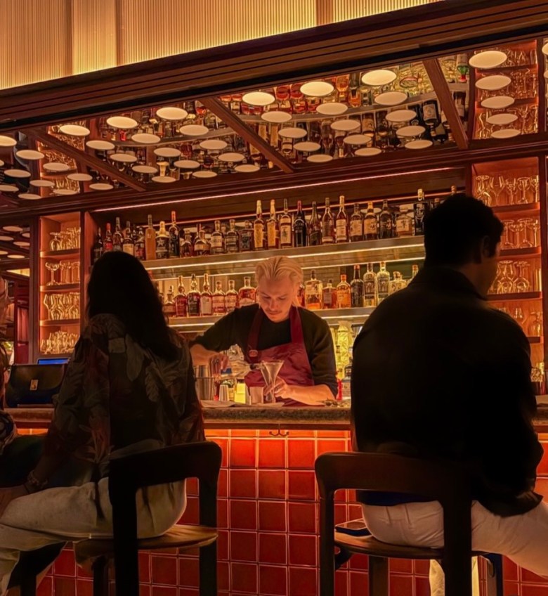 Gilbert Votion does his magic behind the bar at Jue Let.