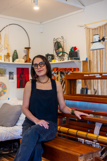 A photograph of artist Jenelle Esparza in her studio.