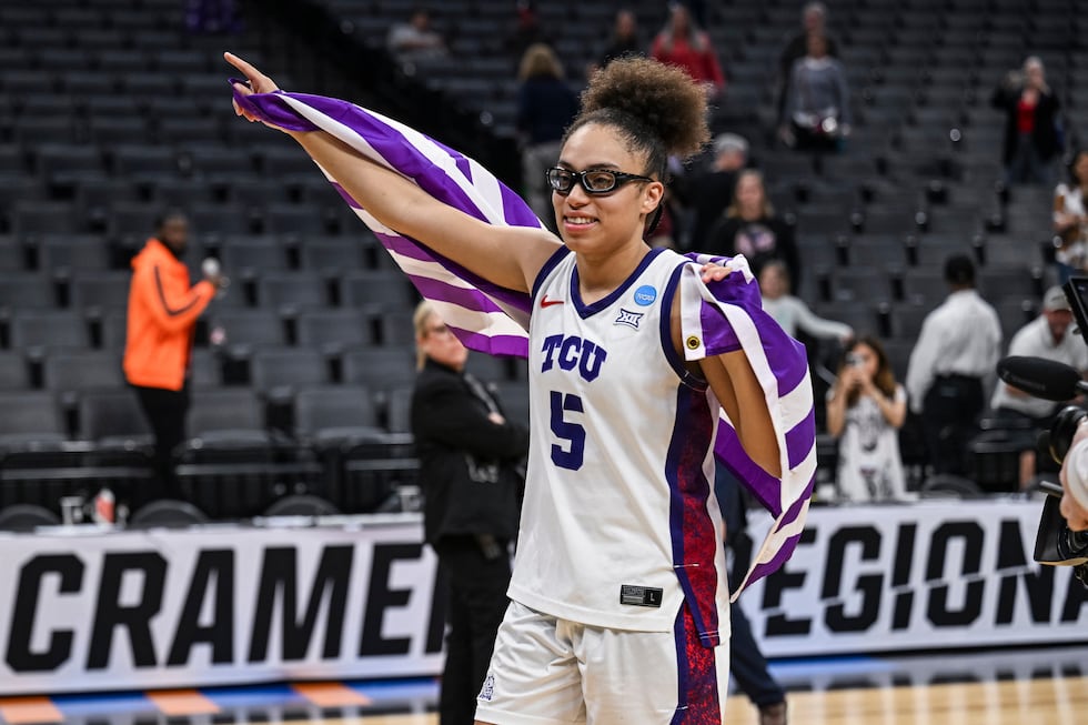 TCU guard Olivia Miles (5) smiles after her team defeated Virginia in the Sweet 16 of the NCAA...