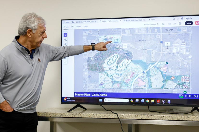 Real estate developer Fehmi Karahan points out key areas of the Fields development master plan.