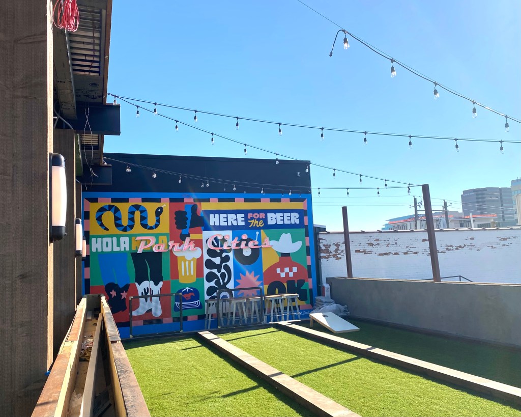 CRAFT has a large rooftop space with games like corn hole.