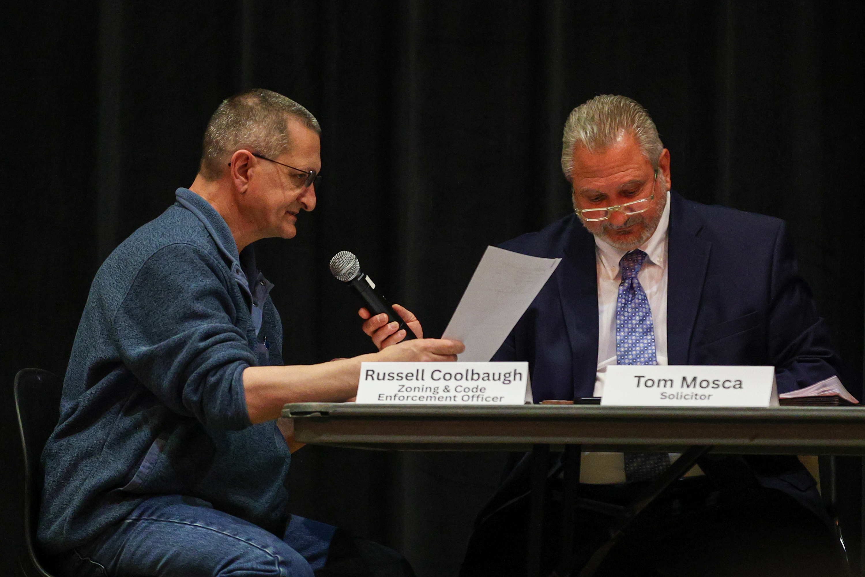 Solicitor Tom Mosca questions Zoning and Code Enforcement Officer Russell...