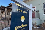 A for sales sign stand outside a single-family residence on the market in the Alamo Placita...