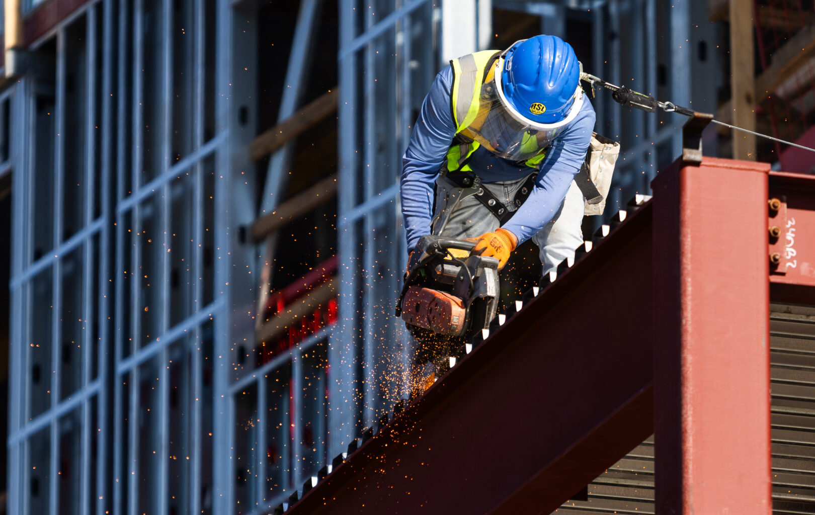 Behind the tarp: A look at the workers behind the Centennial Project