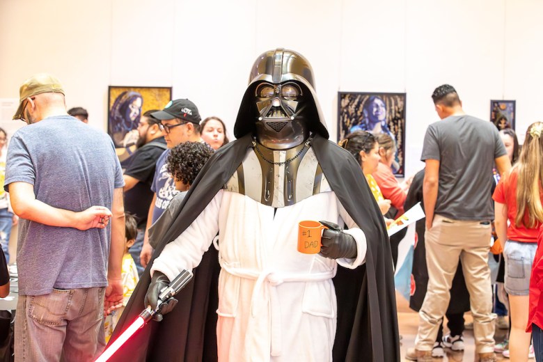 Attendees of a past Pop Madness get their geek on.