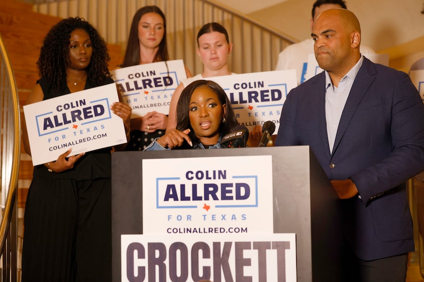 U.S. Rep. Jasmine Crockett speaks  during a news conference as former U.S. Rep. Colin Allred...