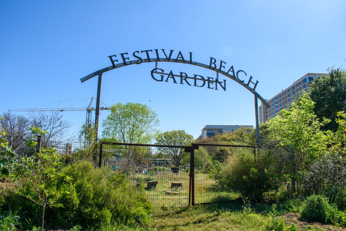The entrance to the Festival Beach Food Forest, where private garden plots are available for annual rental and a community garden offers fresh herbs and vegetables free of charge for neighbors to enjoy.