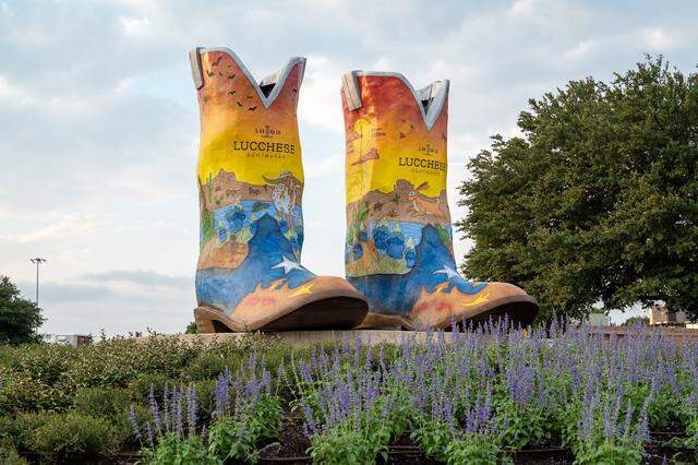 The pair of boots Big Tex wore from 2023 until 2025, designed by Jessica Bonilla from Irving. Big Tex will receive a new pair of boots for the 2026 to 2028 seasons.