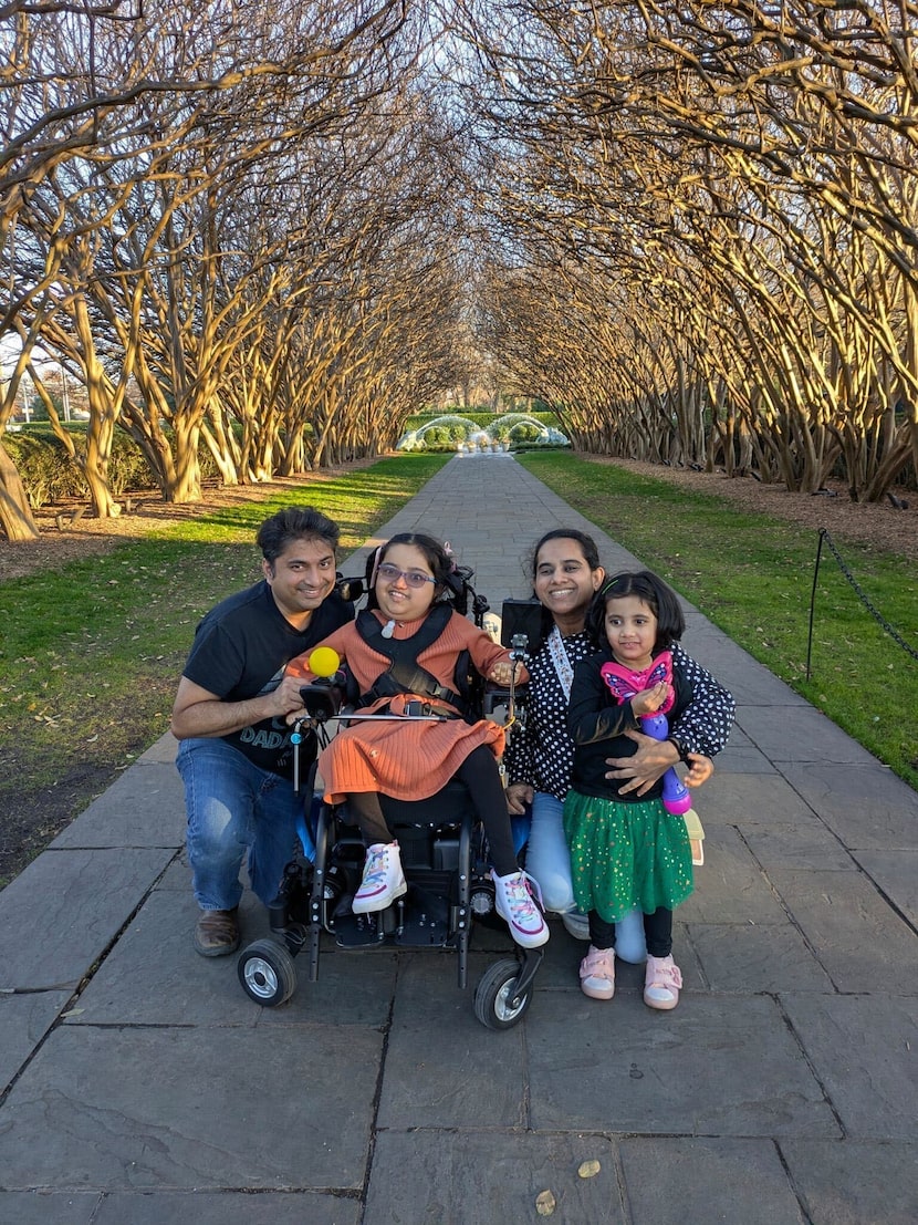 Anju Govind (second from right) and Kiran Ramachandran (far left) with their daughter Aadya...