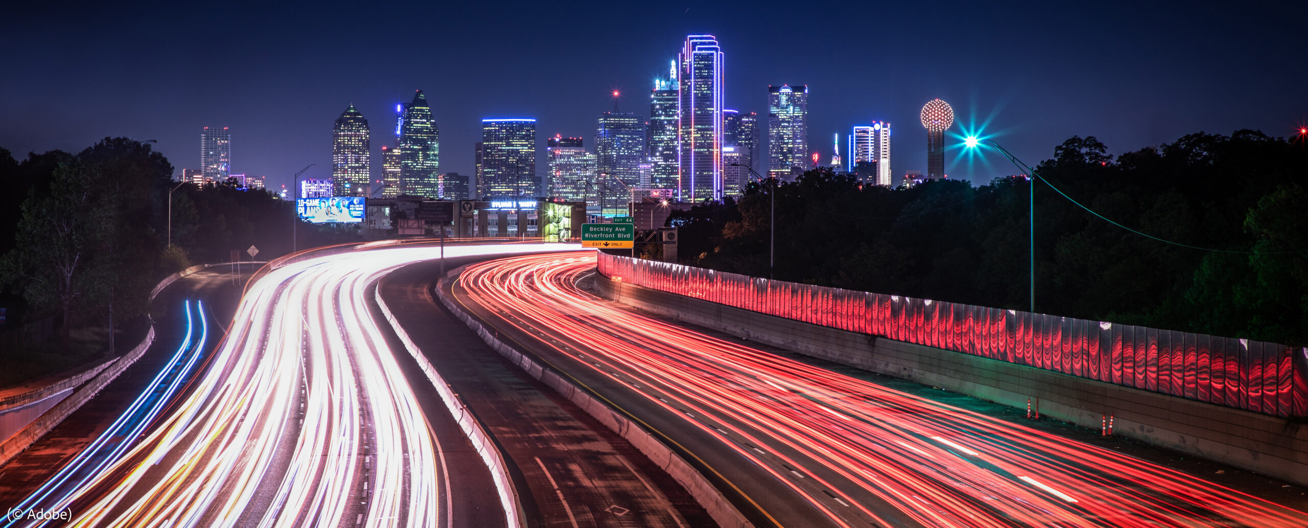 Time exposure of Dallas traffic at night (© Adobe)