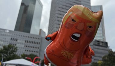 Donald Trump balloon at Dallas No KIngs protest