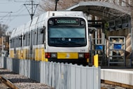A DART Green Line train rolls into Farmers Branch Station, Tuesday, Feb. 24, 2026, in...