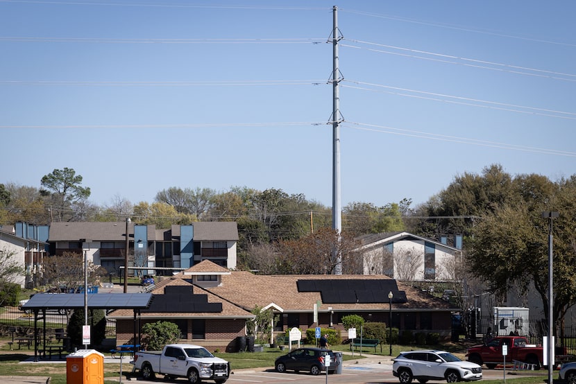 An Oncor transmission line stretches over the Shadow Brook Resilience Hub and Learning...