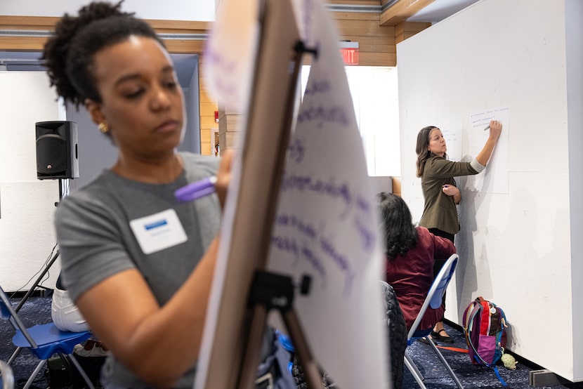 Alyssa Knox, left, and Erin Blackman, with North Central Texas Council of Governments, write...