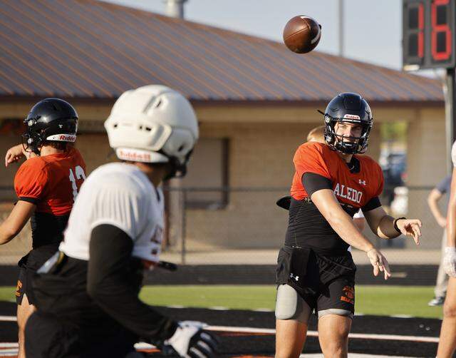 Quarterback Nash McElree completes a pass during Aledo High School’s morning practice at Tim Buchanan Stadium in Aledo, Texas, in an Aug. 18, 2025 photo.