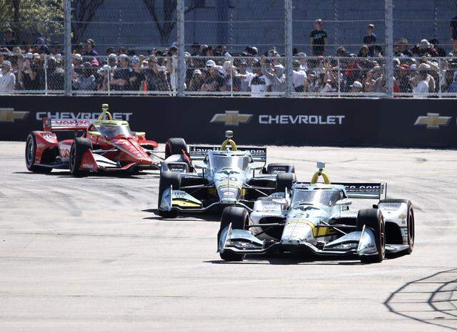 Drivers negotiate a turn during the inaugural Java House Grand Prix of Arlington in Arlington, Texas, Sunday, March, 15, 2026.