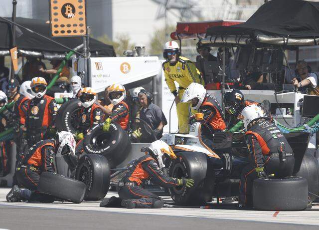 The Dale Coyne Racing car driven by Dennis Hauger (19) makes a pit stop during the inaugural Java House Grand Prix of Arlington in Arlington, Texas, Sunday, March, 15, 2026.