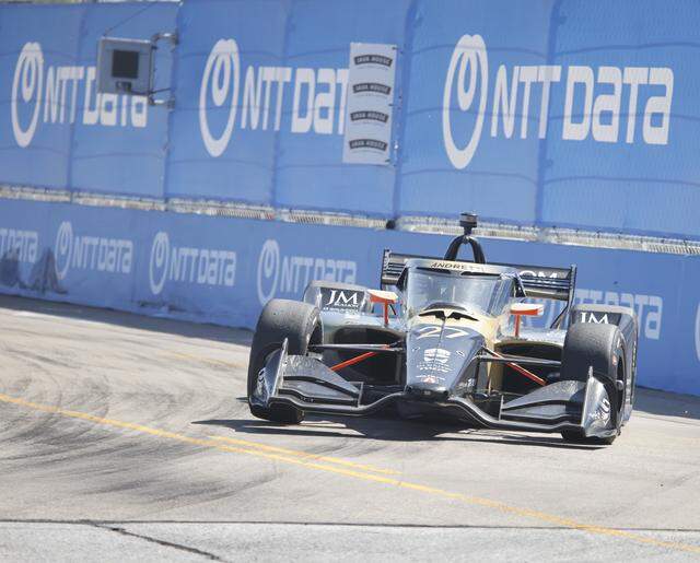 Kyle Kirkwood (27) slides through turn 14 during the inaugural Java House Grand Prix of Arlington in Arlington, Texas, Sunday, March, 15, 2026.