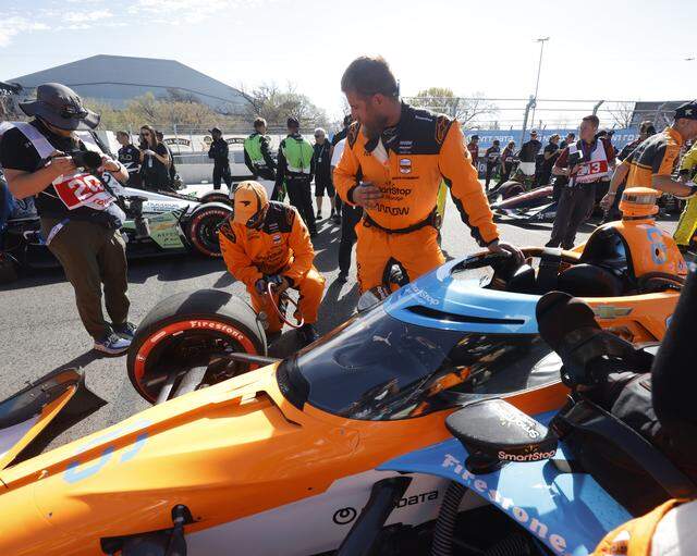 The crew of Nolan Siegel (6) prepares his car on pit row before the inaugural Java House Grand Prix of Arlington in Arlington, Texas, Sunday, March, 15, 2026.