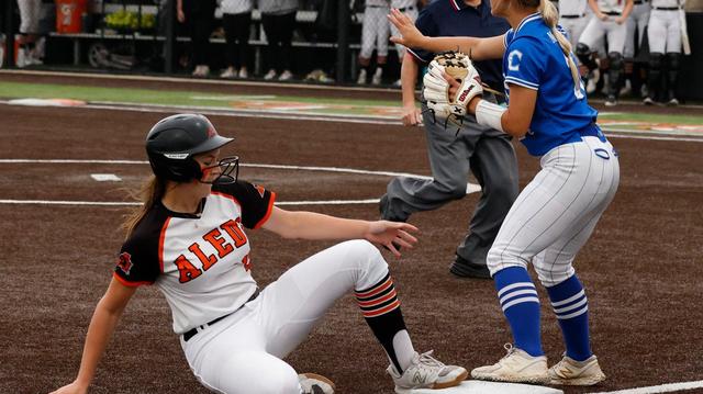 Centennial third baseman Hannah McCurry signals to hold the ball as Aledo third baseman Kyleigh Pawlak reaches third during the UIL Conference 5A Region 1 final softball game at Aledo, Texas, Wednesday, May 22, 2024. Centennial third baseman Hannah McCurry signals to hold the ball as Aledo third baseman Kyleigh Pawlak reaches third during the UIL Conference 5A Region 1 final softball game at Aledo, Texas, Wednesday, May 22, 2024.
