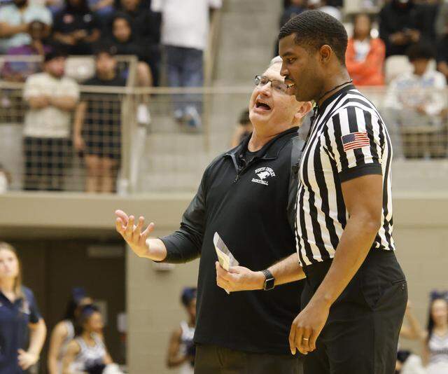 North Crowley head coach Tommy Brakel has a few words with an official as they play Allen during the second half of a UIL Class 6A Division I boys regional final basketball game at Thomas Coliseum in Haltom City, Texas, Friday, Mar. 06, 2026.