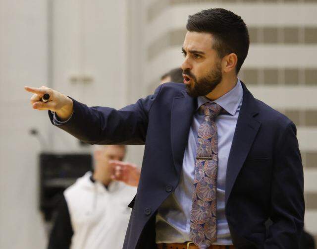 Allen head coach Clark Cipoletta gestures to his team on defense against North Crowley during the first half of a UIL Class 6A Division I boys regional final basketball game at Thomas Coliseum in Haltom City, Texas, Friday, Mar. 06, 2026.