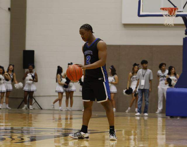 North Crowley guard Kameron Price (2) dribbles away 45 of the remaining 57 seconds of the half against Allen during the first half of a UIL Class 6A Division I boys regional final basketball game at Thomas Coliseum in Haltom City, Texas, Friday, Mar. 06, 2026.