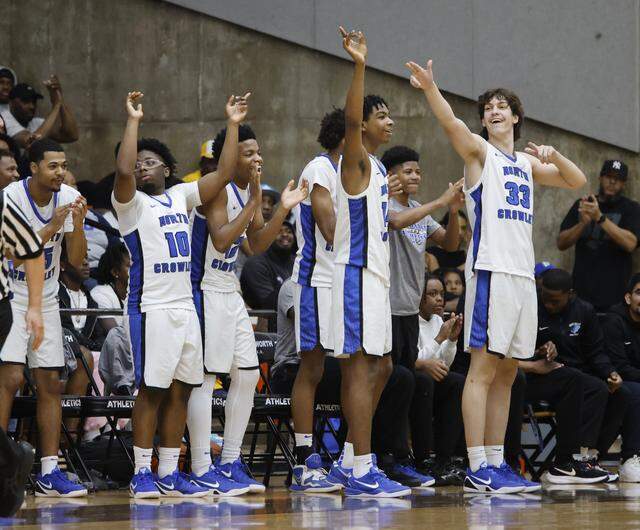 The North Crowley Panther bench signals a turnover by Duncanville during the first half of a UIL Class 6A Division I boys semifinal basketball game at Wilkerson Greines Activity Center in Fort Worth, Texas, Monday, Mar. 10, 2026.