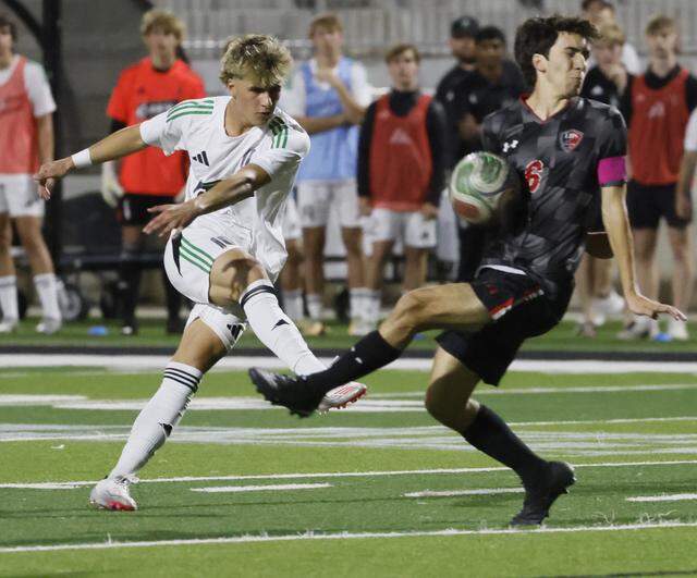 Southlake Carroll’s Cole Swett kicks the ball into the chest of Mansfield Legacy midfielder Luke Lenamond during the second half of a UIL bi-district round soccer playoff game at Crowley ISD Multi-Purpose Stadium in Fort Worth, Texas, on Friday, March 20, 2026.