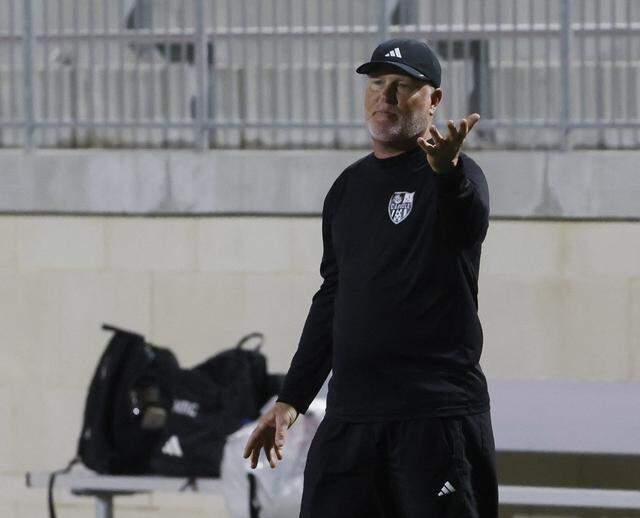 Southlake Carroll head coach Matt Colvin gestures to a player as his team plasy Mansfield Legacy in a UIL bi-district round soccer playoff game at Crowley ISD Multi-Purpose Stadium in Fort Worth, Texas, Friday, March, 20, 2026.