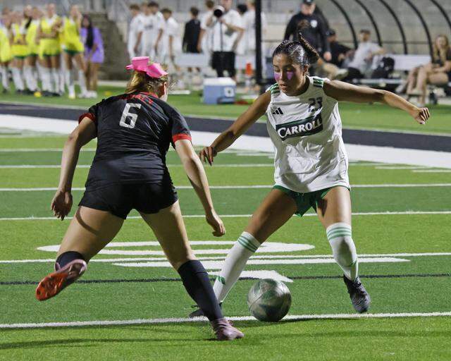 Mansfield Legacy defender Baylie Stanton (6) defends the net against Southlake Carroll forward Mariana Auns during the second half of a UIL bi-district round soccer playoff game at Crowley ISD Multi-Purpose Stadium in Fort Worth, Texas, on Friday, March 20, 2026.