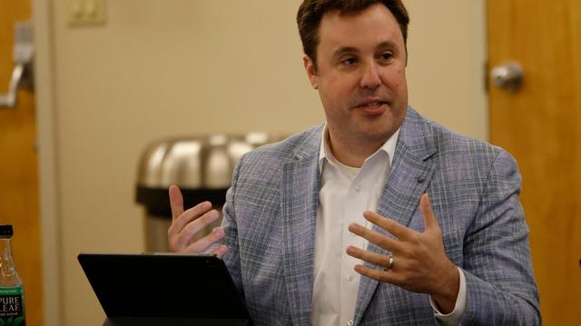 Tarrant GOP chair Tim Davis speaks at a JPS Health Network Board of Managers Meeting in May 2025.