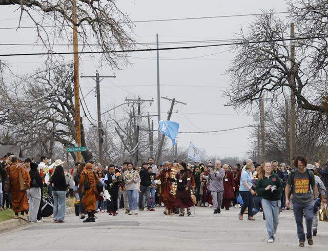 Buddhist monks who walked nearly 2,300 miles to Washington D.C. for peace arrive back at the Húóng Dao Vipassana Bhavana Center in Fort Worth, Texas, on Feb. 14.