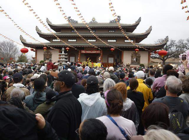 Approximately more than 1,200 people fill the grounds to celebrate with the Buddhist monks who walked nearly 2,300 miles to Washington D.C. for Peace arrive back to the Húóng Do Vipassana Bhavana Center in Fort Worth, Texas, Saturday Feb. 14, 2026.