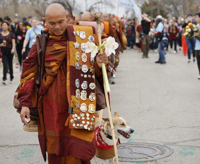 Buddhist monks who walked nearly 2,300 miles to Washington D.C. for Peace arrive back to the Húóng Do Vipassana Bhavana Center in Fort Worth, Texas, Saturday Feb. 14, 2026.